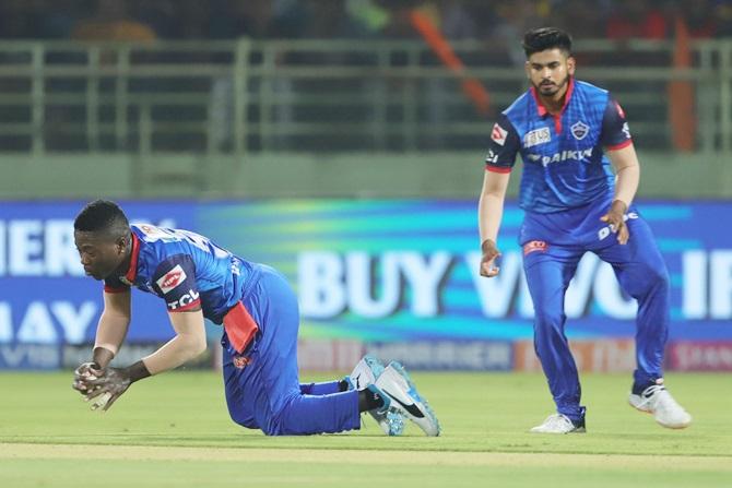 Sherfane Rutherford takes a low catch to dismiss Manish Pandey