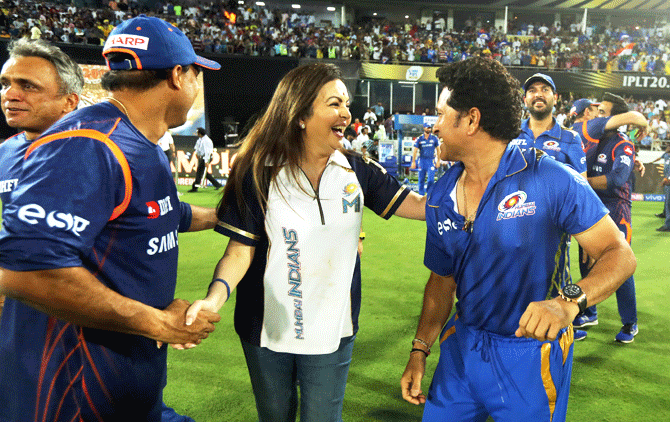 Mumbai Indians' owner Nita Ambani celebrates with team 'Icon' Sachin Tendulkar