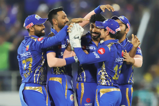 Jasprit Bumrah celebrates with teammates after dismissing Chennai Super Kings' Ambati Rayudu 