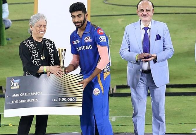 Jasprit Bumrah of Mumbai Indians receives Man of the match award from CoA member Diana Edulji