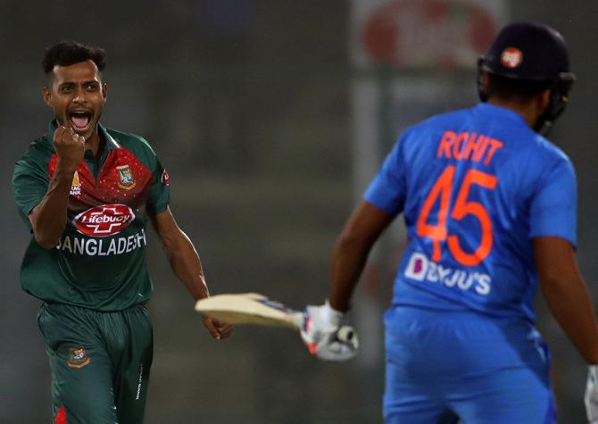 Shafiul Islam celebrates after dismissing Rohit Sharma