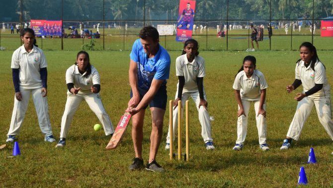 Former Australian cricketer Adam Gilchrist bats during the Cricket Charity Challenge in Mumbai on Wednesday