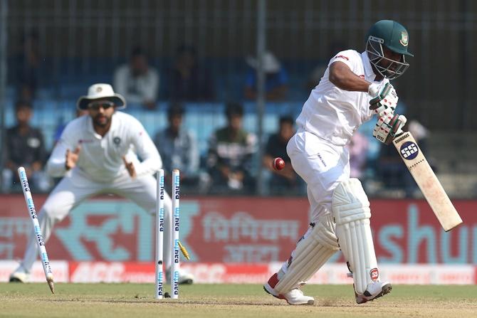 Imrul Kayes is bowled by Umesh Yadav.