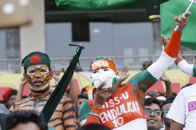 Fans during day 1 of the 2nd Test match between India and Bangladesh held at the Eden Gardens Stadium on Friday