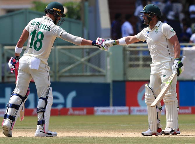 Faf du Plessis, left, with Dean Elgar