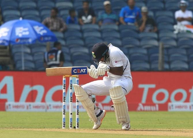 Mayank Agarwal takes evasive action against a bouncer