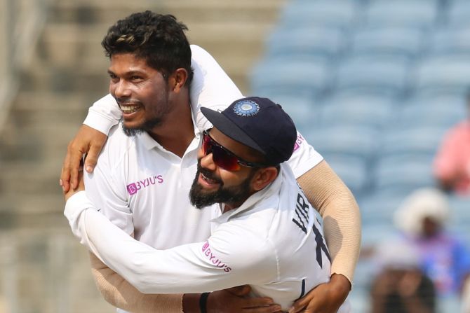 India captain Virat Kohli celebrates with Umesh Yadav after the latter dismissed Vernon Philander 
