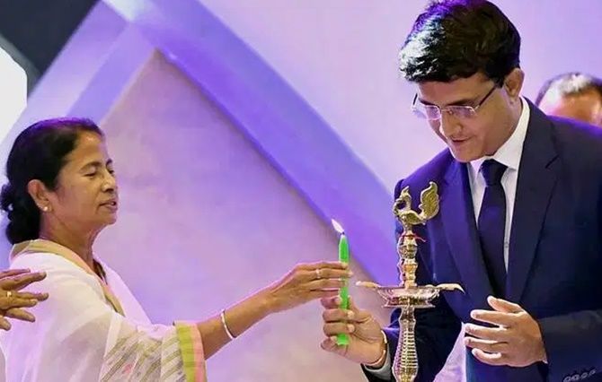 West Bengal Chief Minister Mamata Banerjee with former India captain and outgoing BCCI chief Sourav Ganguly