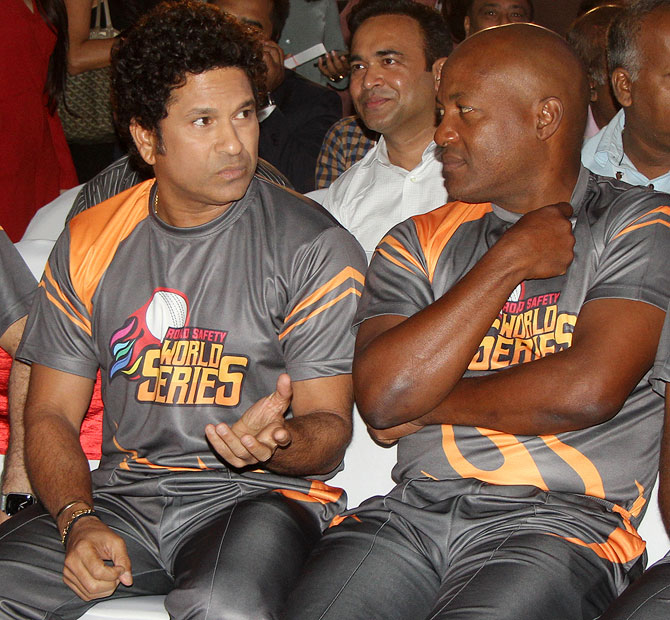 Sachin Tendulkar speaks to Brian Lara during an event in Mumbai on Thursday