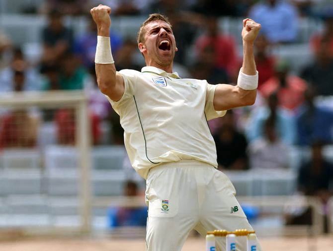  South Africa pacer Anrich Nortje celebrates after getting the umpire's nod for leg before wicket against India captain Virat Kohli