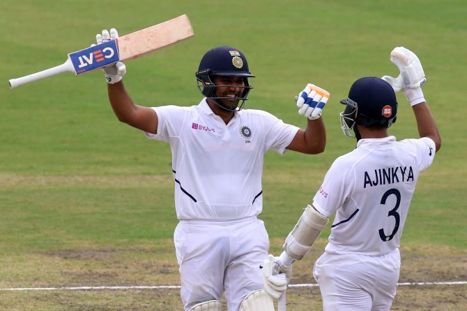 Rohit Sharma celebrates with Ajinkya Rahane on completing his century on Day 1 of the 3rd Test against South Africa in Ranchi on Saturday.  With India reduced to 39 for three, Rohit (117 batting off 164 balls) and Rahane (83 batting off 135) shared an unbeaten 185-run stand to stage the home team's recovery