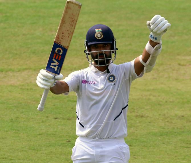 Ajinkya Rahane celebrates completing his century