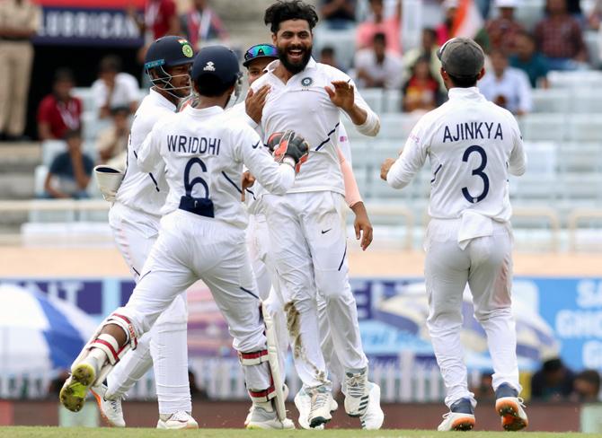 Ravindra Jadeja celebrates dismissing Zubayr Hamza.