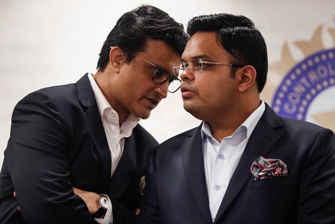 BCCI president Sourav Ganguly speaks to BCCI secretary Jay Shah during a press conference