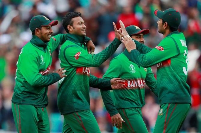 Shakib Al Hassan and his Bangladesh teammates celebrate a dismissal
