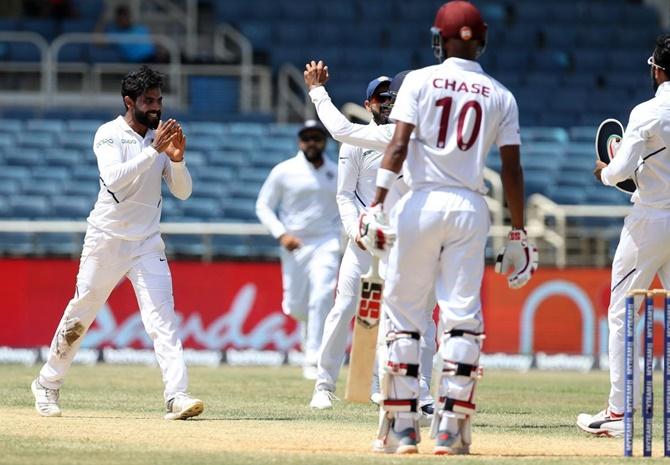 Ravindra Jadeja celebrates after dismissing Roston Chase.