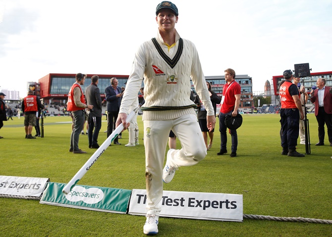 Australia's Steve Smith celebrates wining the match and retaining the Ashes