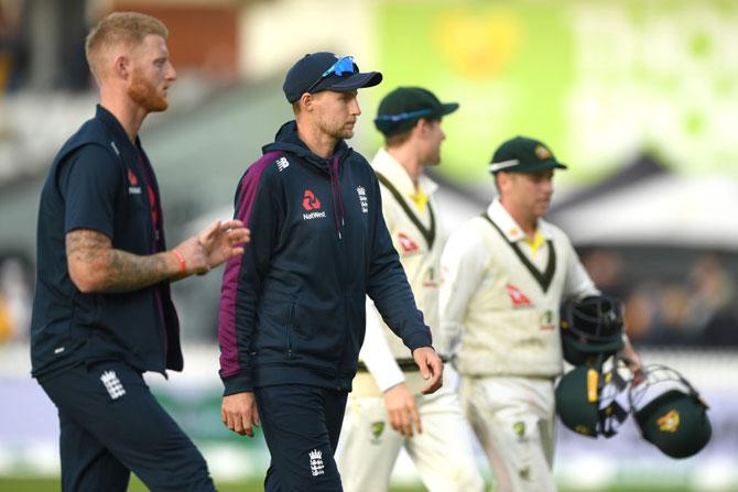 England captain Joe Root with Ben Stokes after losing the 4th Test at Old Trafford in Manchester on Sunday