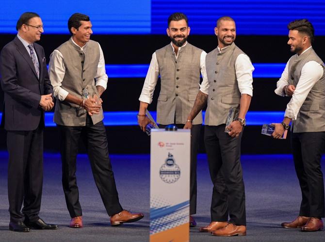 (From left), DDCA president Rajat Sharma, cricketers Navdeep Saini, Virat Kohli,Shikhar Dhawan and Rishabh Pant during a function to rename Feroz Shah Kotla stadium to Arun Jaitley Stadium