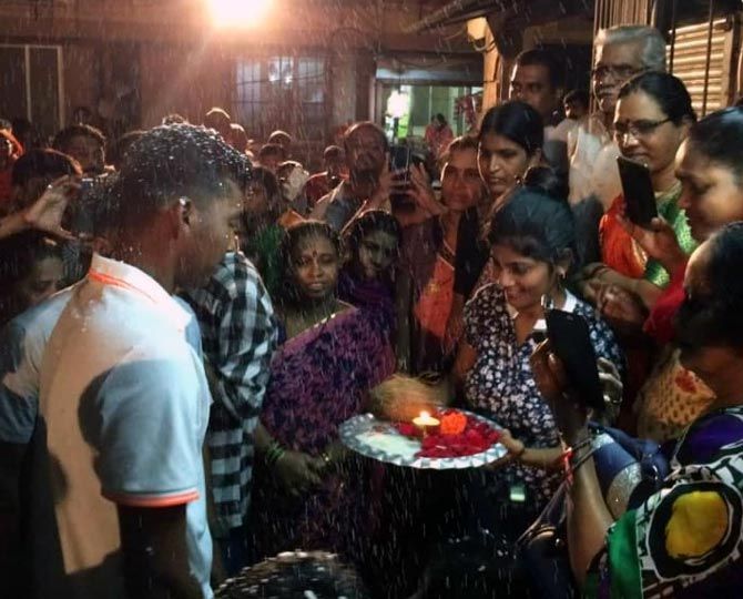 Atharva Ankolekar gets a warm welcome from his friends and neighbours on his arrival in Mumbai on Sunday night.