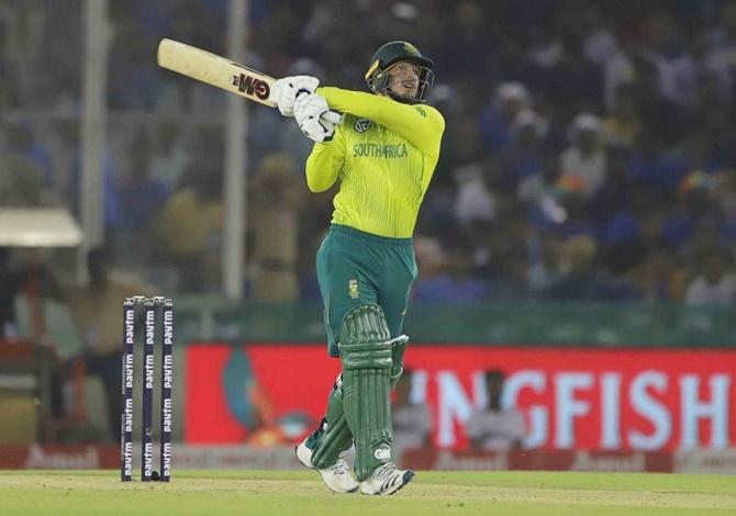 South Africa captain Quinton de Kock hits a four during the second T20 International against India, in Mohali,