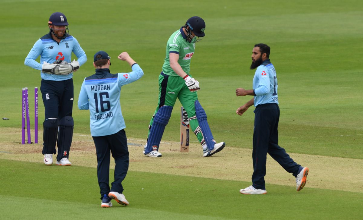 England's Adil Rashid celebrates on dismssing Ireland's Kevin O'Brien