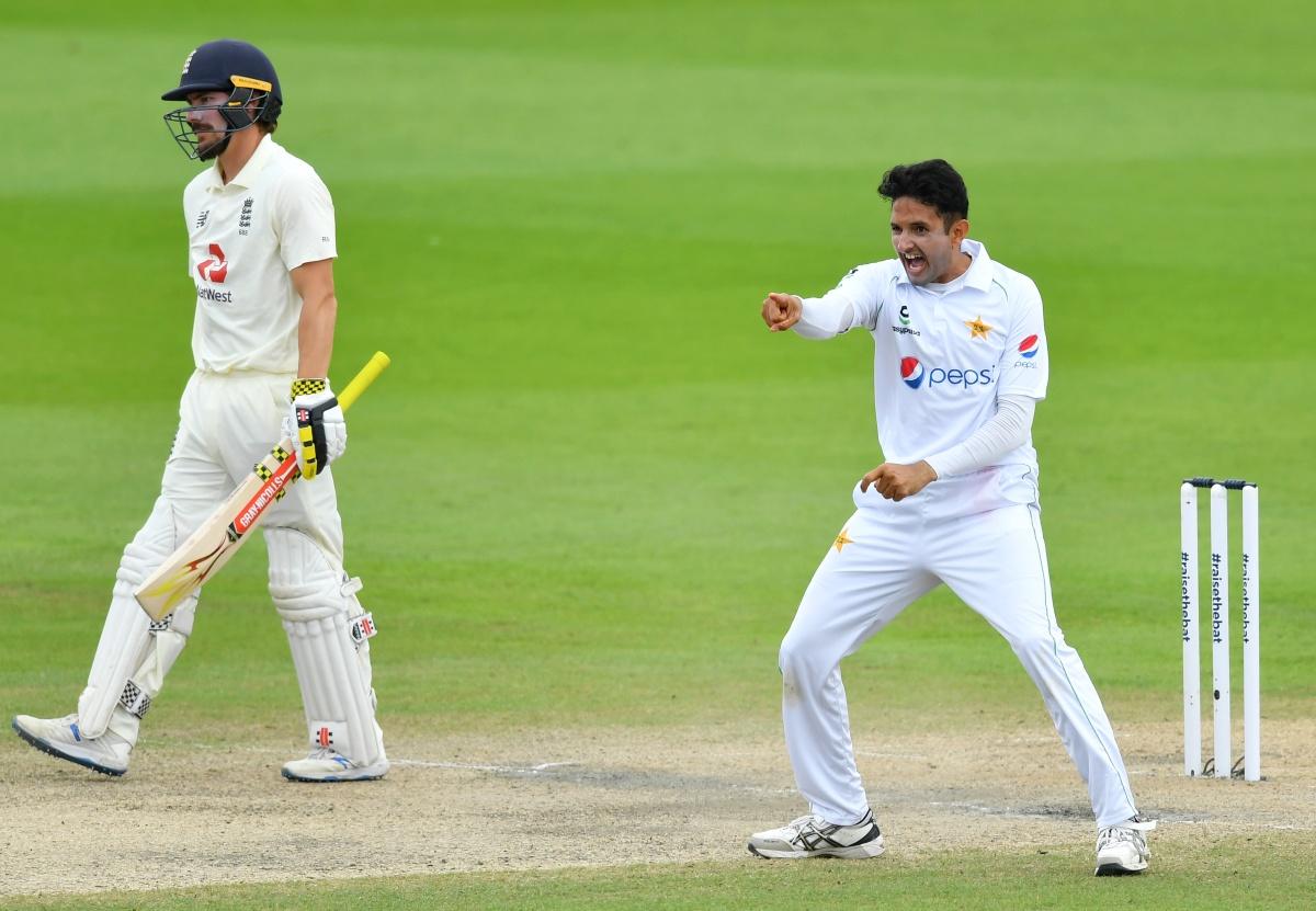 Mohammad Abbas of Pakistan celebrates taking the wicket of Rory Burns of England 