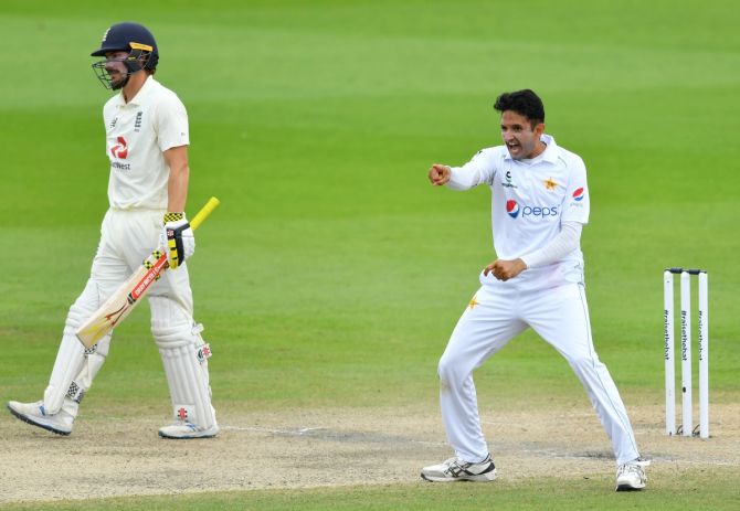 Mohammad Abbas of Pakistan celebrates taking the wicket of Rory Burns of England 