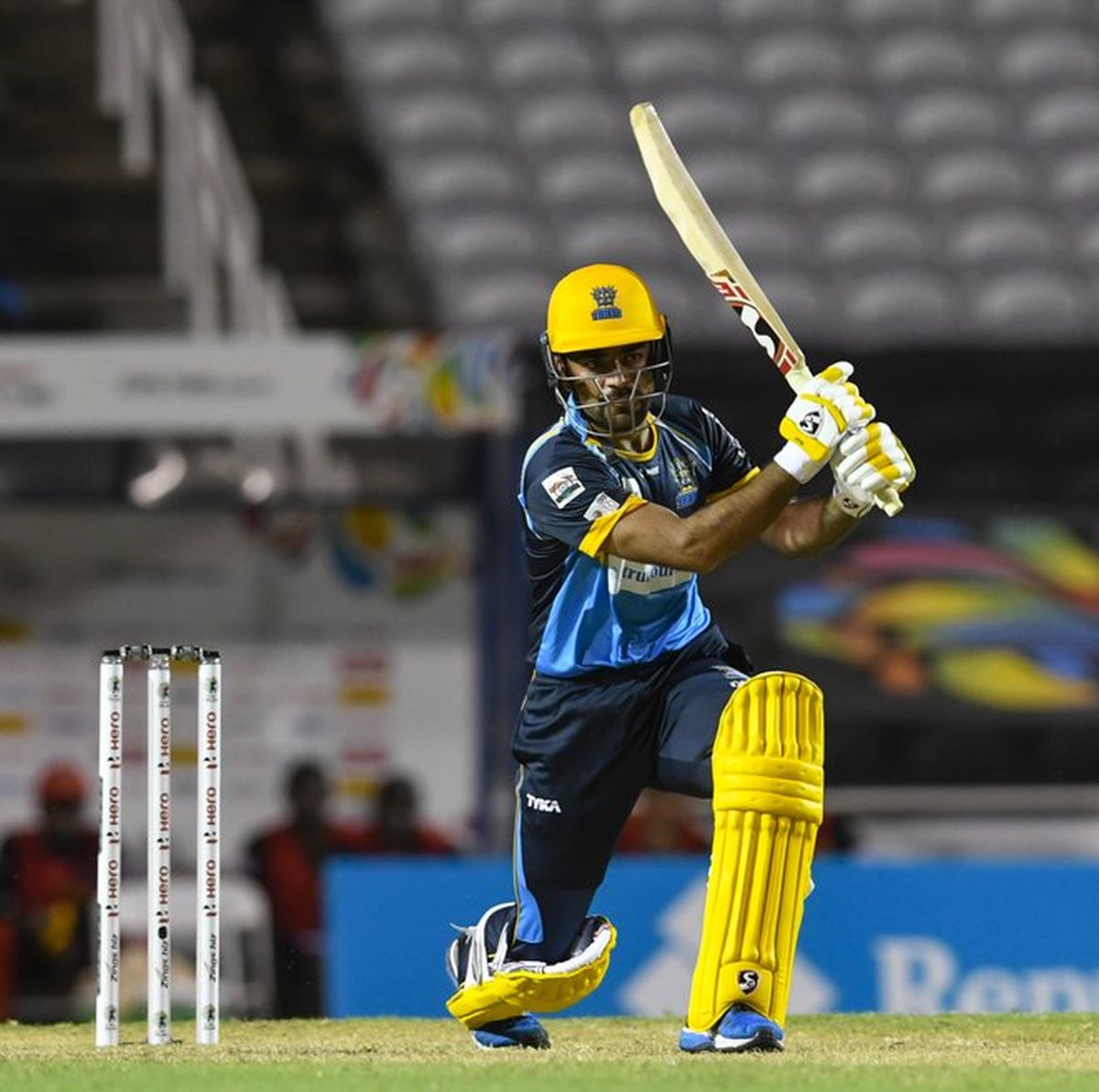 Barbados Tridents' Rashid Khan bats during his innings of 26 against St Kitts & Nevis Patriots in their opening match of the Caribbean Premier League on Tuesday