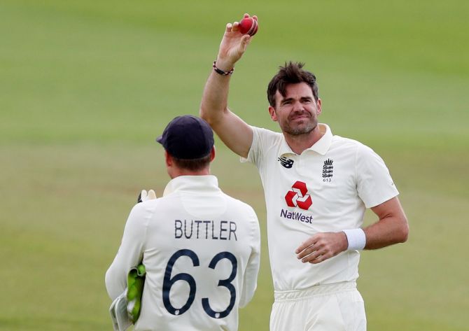 England's James Anderson holds up the ball as he celebrates picking his 600th Test wicket on Tuesday
