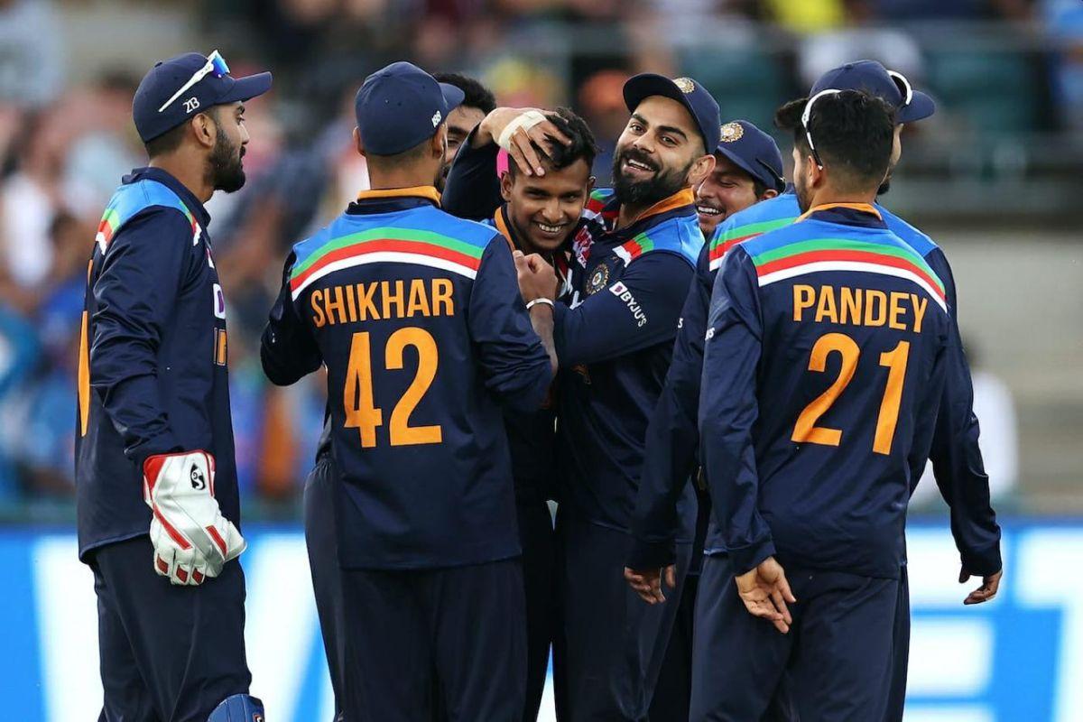 T Natarajan celebrates with teammates on claiming the wicket of Ashton Agar at the Manuka Oval in Canberra on Wednesday