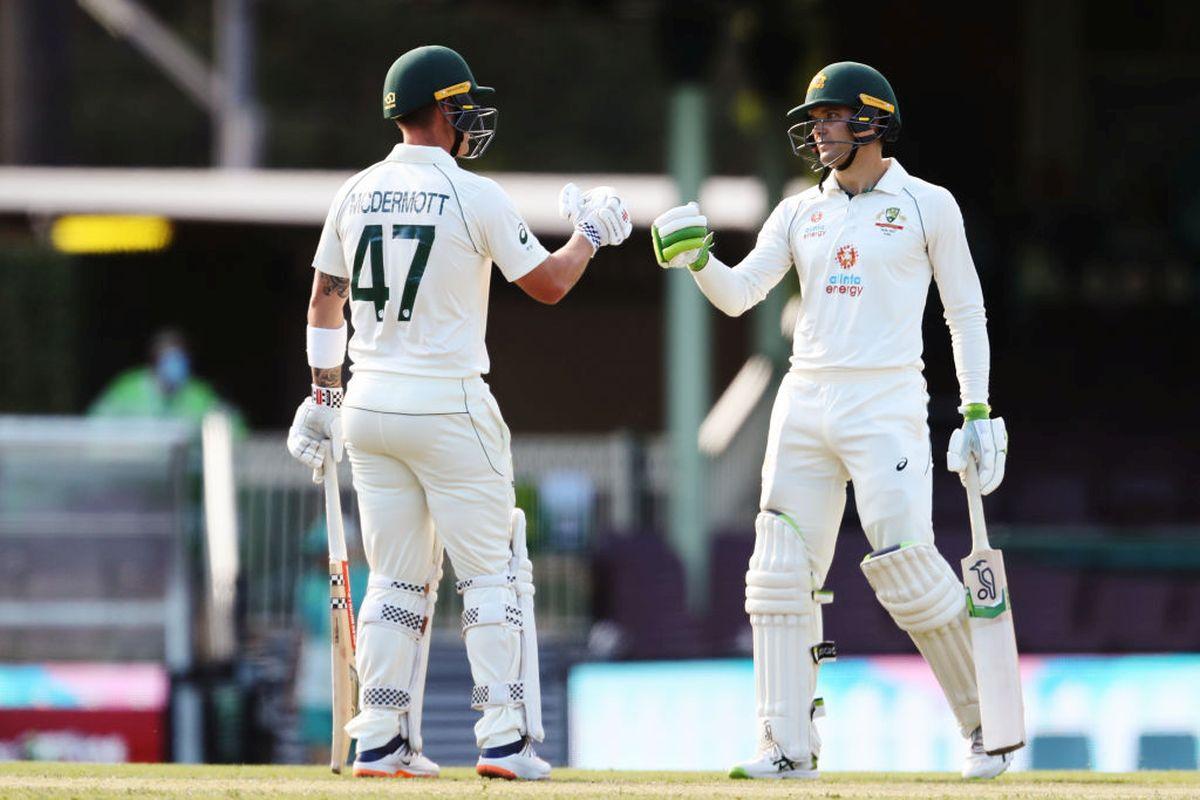 Australia A's Alex Carey and Ben McDermott celebrate their half centuries