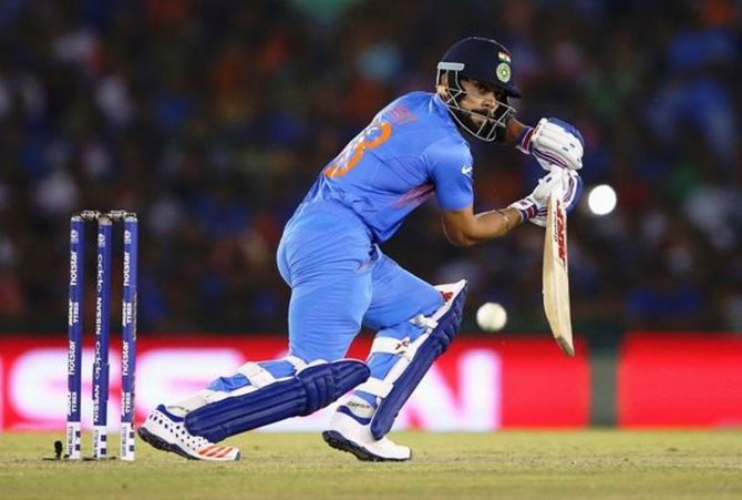 Virat Kohli scored a blistering 82 off 51 balls, studded with nine fours and two sixes during the ICC WT20 Group 2 match against Australia in Mohali on March 27, 2016