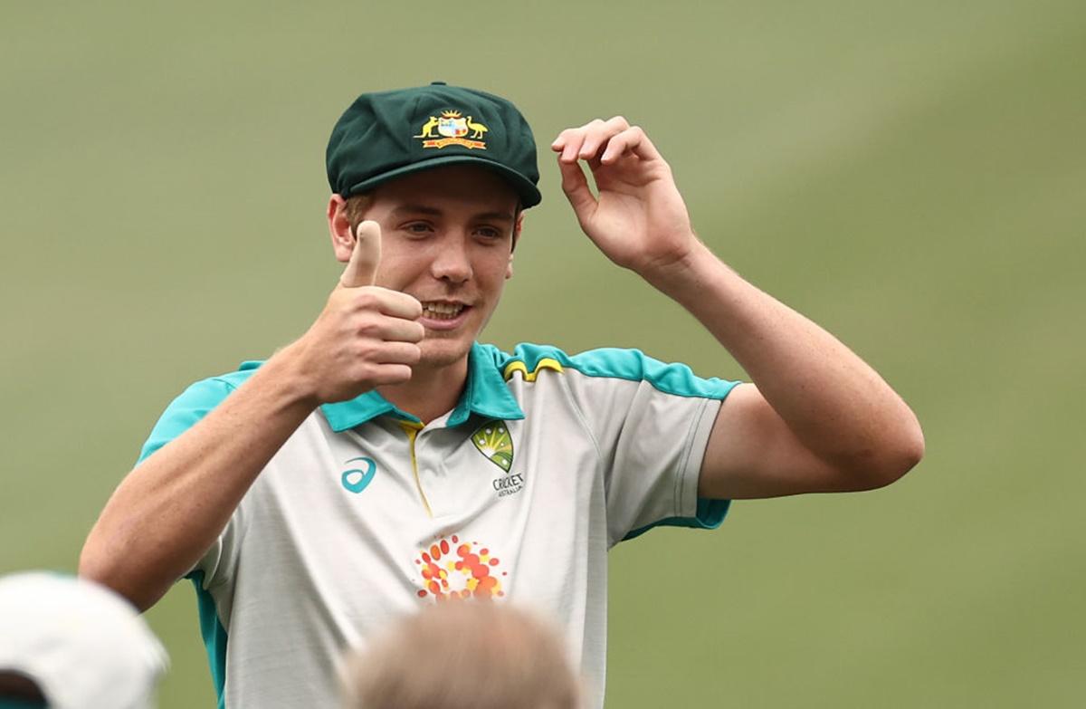 Cameron Green celebrates after receiving his Baggy Green Cap