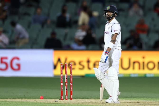 Virat Kohli reacts after being run-out following a mix-up with Ajinkya Rahane.