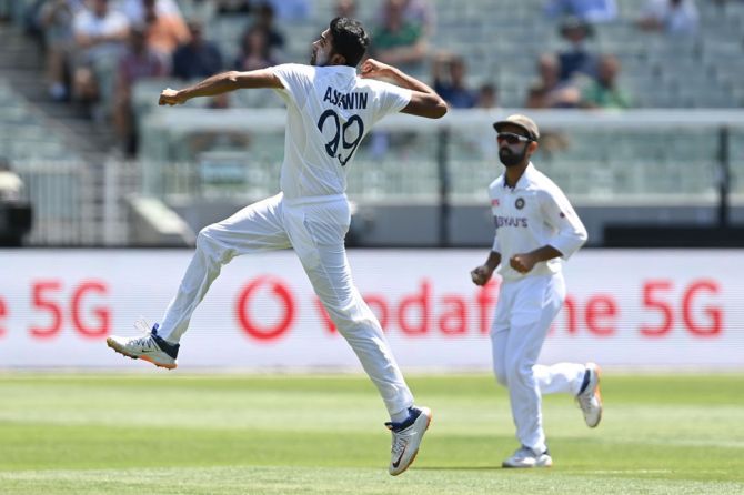 India's Ravichandran Ashwin celebrates getting the wicket of Australia's Steve Smith during Day 1 of the second Test, at Melbourne Cricket Ground on Saturday.