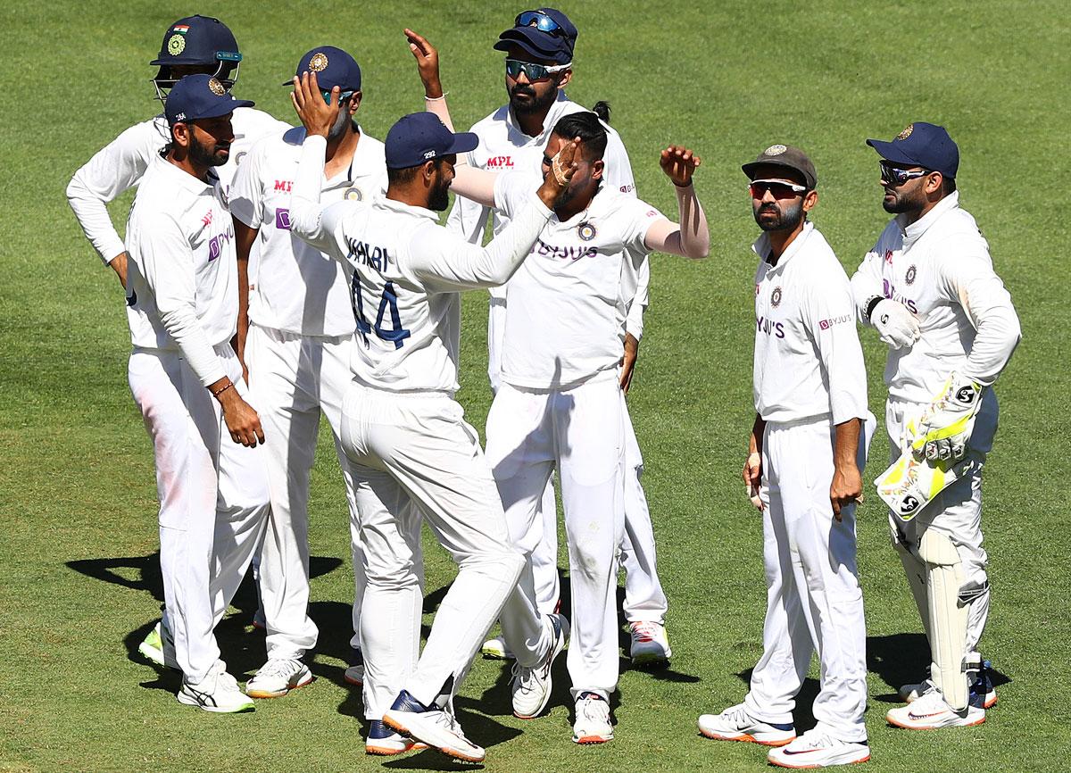 Mohammed Siraj celebrates taking the wicket of Cameron Green