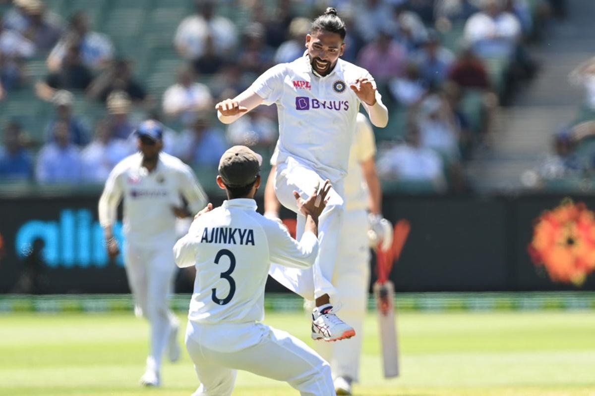 Mohammed Siraj celebrates with skipper Ajinkya Rahame after dismissing Marnus Labuschagne