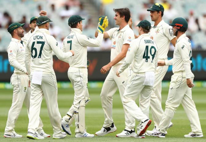 Australia pacer Pat Cummins celebrates taking the wicket of India opener Shubman Gill during Day 2 of the second Test, at Melbourne Cricket Ground, on Sunday. 