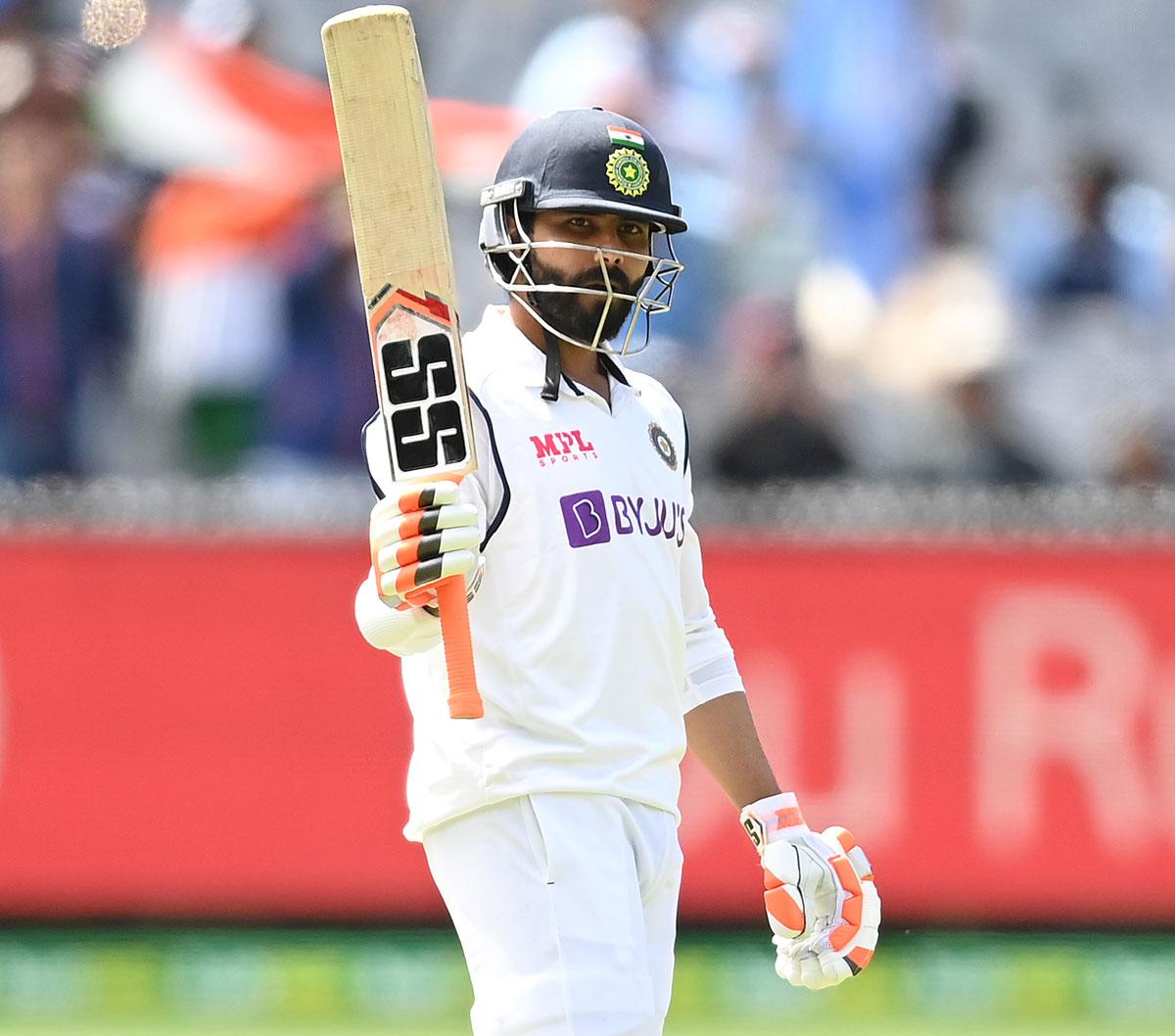 Ravindra Jadeja celebrates scoring 50