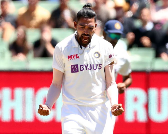 Pacer Mohammed Siraj celebrates after dismissing Cameron Green.