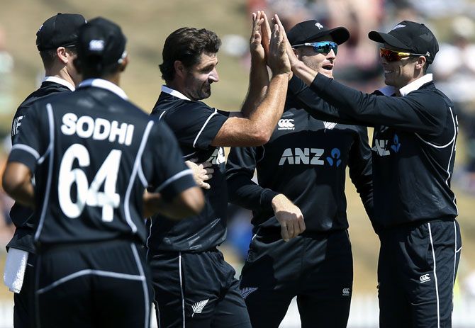 New Zealand's players celebrate the dismissal of Prithvi Shaw