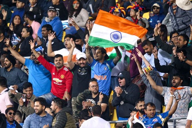 Indian fans show their support for their team during Game 4 of the Twenty20 series against New Zealand, at Sky Stadium in Wellington, on January 31, 2020.
