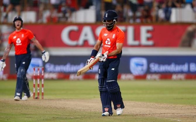 Moeen Ali reacts as he leaves the field after being dismissed by South Africa's Lungi Ngidi.