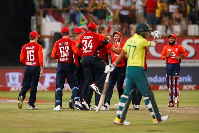 England players celebrate beating South Africa in the second T20I, at the Kingsmead Cricket Ground, in Durban. 