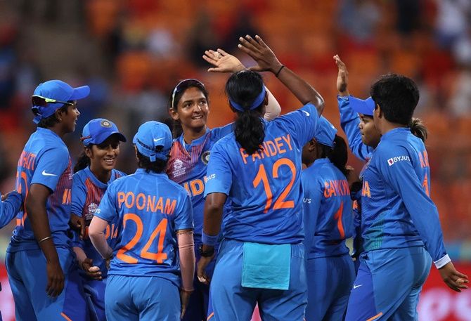 India's players celebrates victory over Australia in the opening match of the ICC women's T20 World Cup, at Sydney Showground stadium.