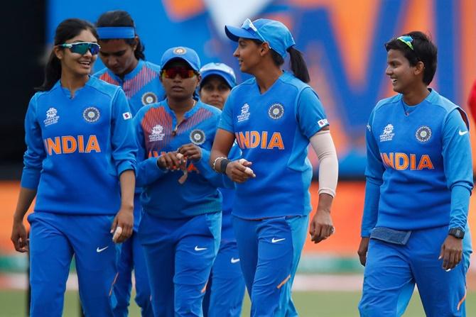 India's players are all smiles after clinching victory.