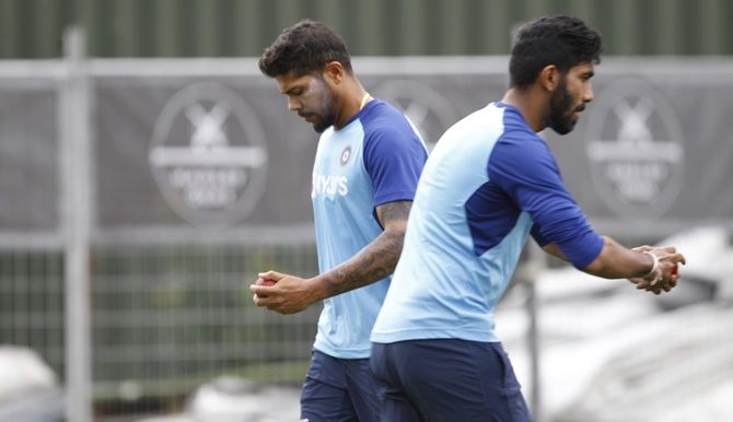 Umesh Yadav and Jasprit Bumrah bowl in the nets. 
