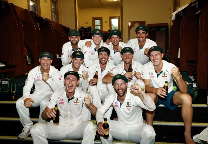 Australia players celebrate in the change rooms after defeating New Zealand on Day 4 of the third Test and sweeping the series 3-0 at Sydney Cricket Ground in Sydney, Australia, on Monday