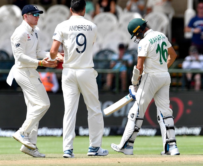 England's James Anderson celebrates after dismissing South Africa's Keshav Maharaj on Tuesday